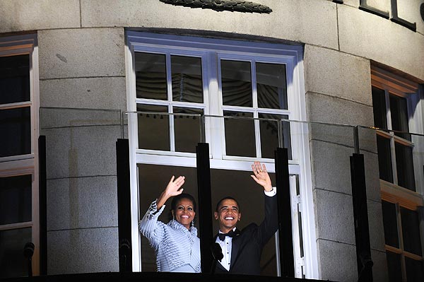 ( Jewel Samad / AFP / Getty Images / December 10, 2009 ) President Obama and First Lady Michelle Obama greet the torch parade from the balcony of the Grand Hotel in Oslo, the Norwegian capital, where he accepted the Nobel Peace Prize.